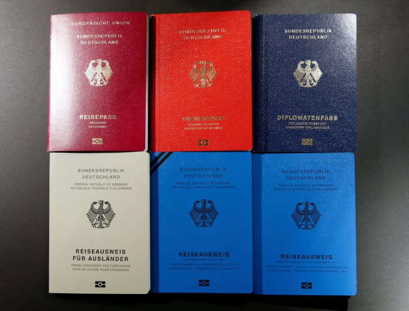 FILE PHOTO: Specimens of German new electronic passports are pictured during a presentation to the media in Berlin