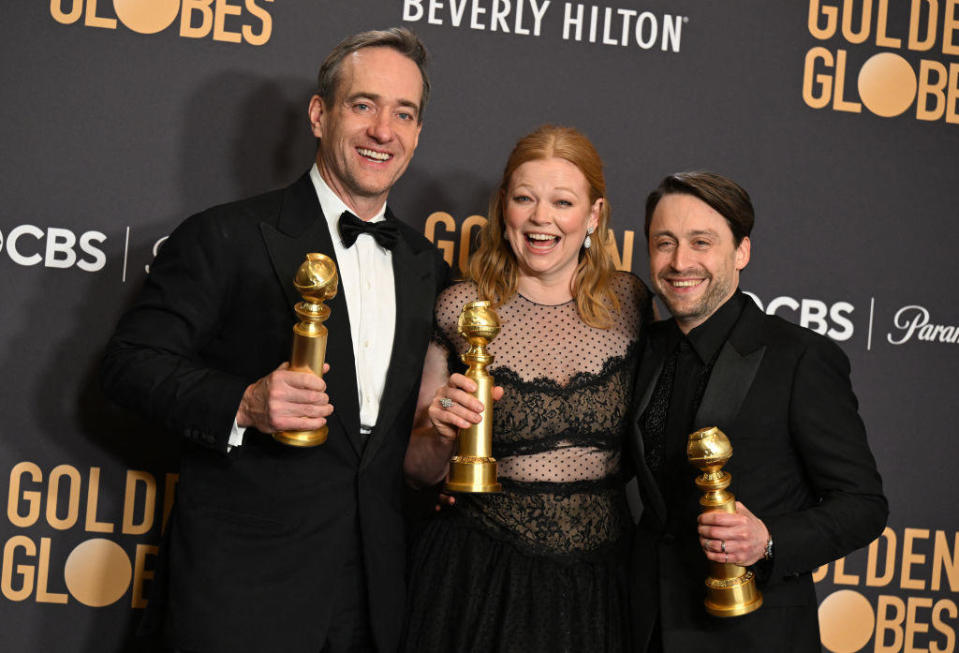Matthew Macfayden, Sarah Snook and Kieran Culkin pose with their Golden Globe awards for their performances on HBO's 