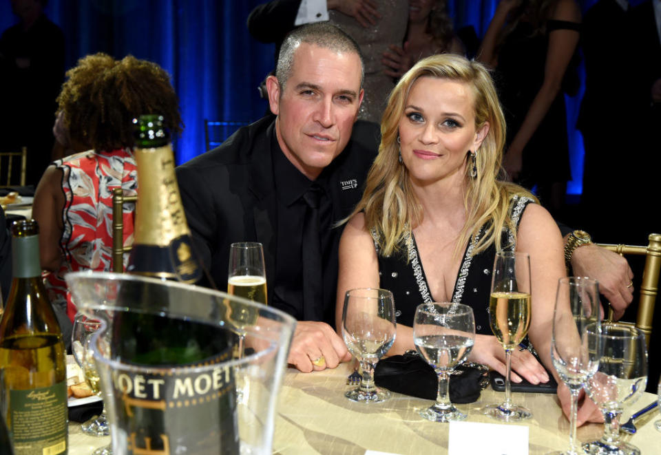 Talent agent Jim Toth (L) and producer-actor Reese Witherspoon attend a Moet & Chandon event together