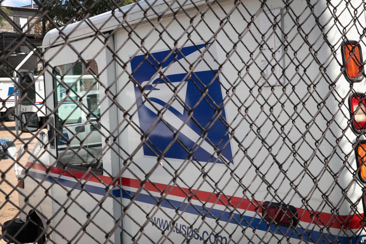 United States Postal Service (USPS) trucks are parked at a postal facility on August 15, 2019 in Chicago, Illinois.
