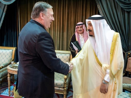 Saudi Arabia's King Salman shakes hands with US Secretary of State Mike Pompeo in the capital Riyadh on April 29, 2018