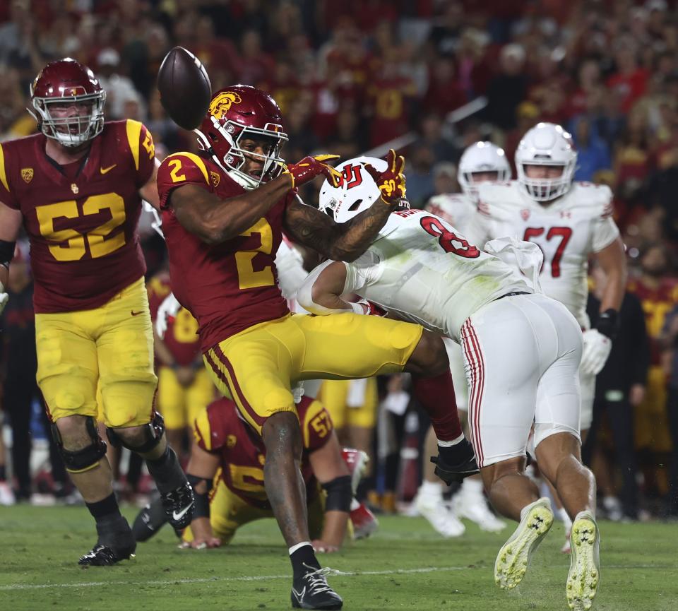 Utah Utes safety Cole Bishop (8) hits USC Trojans wide receiver Brenden Rice (2) at the Los Angeles Memorial Coliseum on Saturday, Oct. 21, 2023. | Laura Seitz, Deseret News