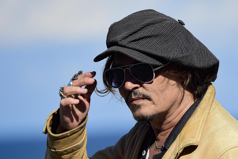 US actor and film producer Johnny Deep during the photocall to promote his film "Crock of Gold: A Few Rounds with Shane Macgoman" at the 68th San Sebastian Film Festival, in San Sebastian, northern Spain, Sunday, Sept. 20, 2020. (AP Photo/Alvaro Barrientos)