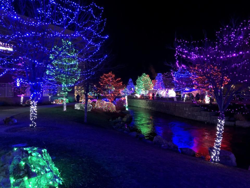 christmas tree and festival of christmas lights outdoors along the street and waterfront shops in idaho, united states