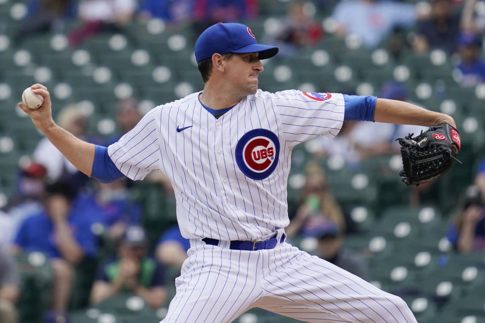 Chicago Cubs starting pitcher Kyle Hendricks throws against the Milwaukee Brewers during the first inning of a baseball game in Chicago, Wednesday, April 7, 2021. (AP Photo/Nam Y. Huh)