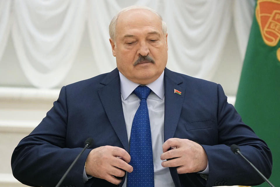 Belarusian President Alexander Lukashenko arrives to attend a meeting with foreign correspondents, in Minsk, Belarus, Thursday, July 6, 2023. (AP Photo/Alexander Zemlianichenko)