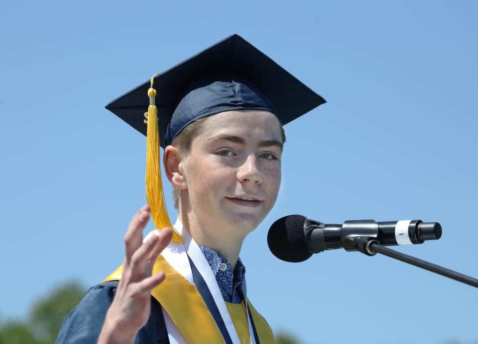 Valedictorian Jason McGettrick speaks during graduation ceremonies Saturday, June 4, 2022, at Plymouth North High School.