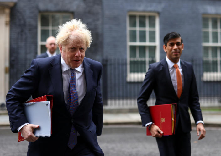 Britain&#39;s Prime Minister Boris Johnson and Chancellor of the Exchequer Rishi Sunak arrive for a Cabinet meeting, in London, Britain October 13, 2020. REUTERS/Simon Dawson