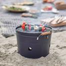 <p>If cucumber sandwiches simply won’t cut the mustard when it comes to your picnic spread, take along this portable BBQ bucket to create a tasty chargrilled lunch on-the-go. Its compact size and acacia wood handles mean it’s easy to store and carry. £55, <a href="https://go.redirectingat.com?id=127X1599956&url=https%3A%2F%2Fwww.grahamandgreen.co.uk%2Fcarbon-grey-round-bbq-bucket&sref=https%3A%2F%2Felledecoration.co.uk%2Fdesign%2Fg36766200%2Fbest-picnic-sets%2F" rel="nofollow noopener" target="_blank" data-ylk="slk:grahamandgreen.co.uk;elm:context_link;itc:0;sec:content-canvas" class="link ">grahamandgreen.co.uk</a></p>