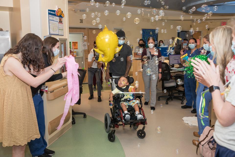 Tommy Wraggs of Wausau pushes his 3-year-old son Kingston Vang-Wraggs out of American Family Children’s Hospital in Madison on June 29. Kingston, who was diagnosed with congenital nephrotic syndrome, a rare kidney condition, in 2019 and received a kidney transplant in June, is heading home after spending almost two years in the hospital.