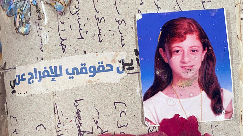 A page of Salma's diary featuring a photograph of her at age 12 and the words 