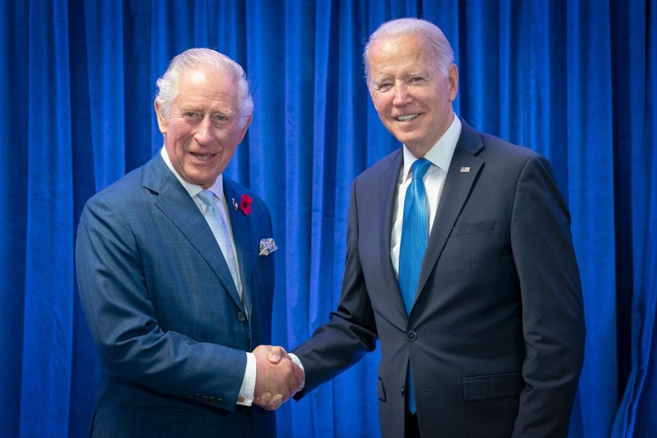 Britain's then Prince Charles, left, greets President of the United States Joe Biden ahead of their bilateral meeting during the COP26 summit in Glasgow, Scotland, Tuesday, Nov. 2, 2021. Biden will head to Europe this week for a three-country swing in an effort to bolster the international coalition against Russian aggression as the war in Ukraine continues well into its second year. The U.S. president will begin his trip to the continent in London, where he will meet with King Charles III.