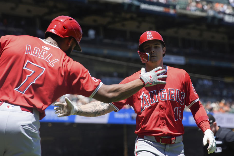 Los Angeles Angels' Mickey Moniak, right, celebrates with Jo Adell after hitting a solo home run against the San Francisco Giants during the second inning of a baseball game Saturday, June 15, 2024, in San Francisco. (AP Photo/Godofredo A. Vásquez)