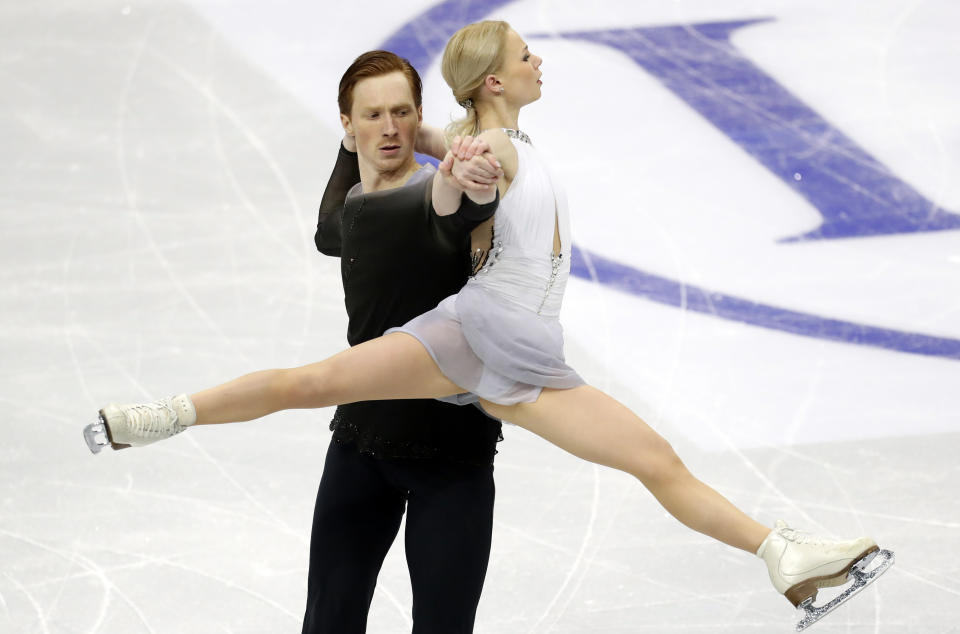 Evgenia Tarasova and Vladimir Morozov of Russia perform in the pairs free skating at the ISU European figure skating championships in Minsk, Belarus, Thursday, Jan. 24, 2019. (AP Photo/Sergei Grits)