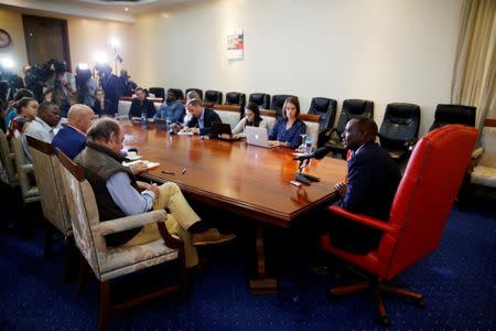 Kenyan Deputy President William Ruto (R) speaks during a news conference with members of the Foreign Correspondents Association of East Africa in his official residence in Karen, Nairobi, Kenya, October 17, 2017. REUTERS/Baz Ratner