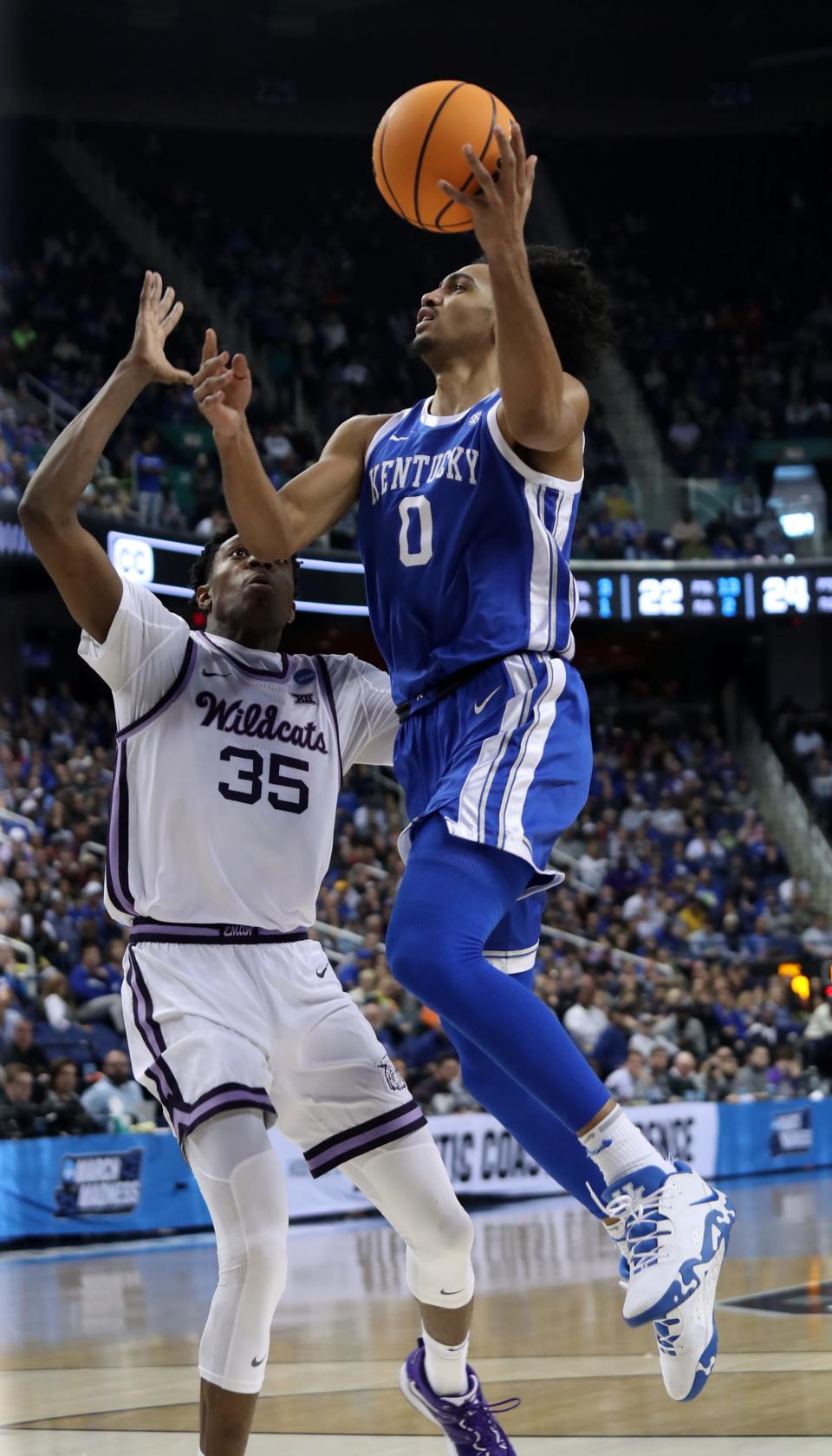 Kentucky’s Jacob Toppin makes a shot against Kansas State’s Nae’Qwan Tomln in the second round of the NCAA Tournament.March 19, 2023