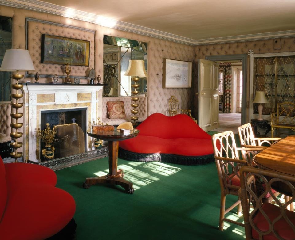 An outré homage to Tinseltown's tongue-in-cheek temptress, these playful Surrealist couches were designed to shock and amuse. Here, they are shown in situ at Monkton, the former home of Edward James. Now in the V&A Museum, they are deemed an iconic piece of 20th-century furniture.