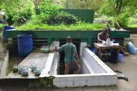 <p>Public toilets in Abidjan, Ivory Coast. (Photo: Issouf Sanogo/AFP/Getty Images) </p>