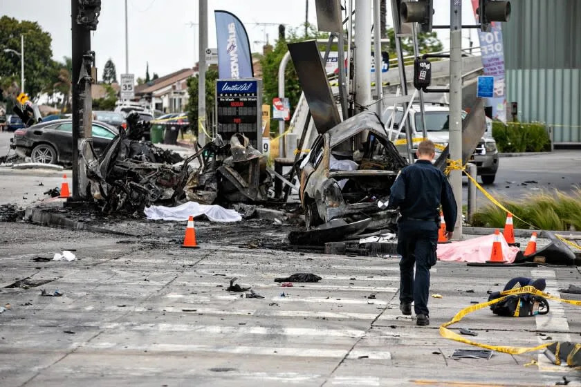 LOS ANGELES, CA - AUGUST 04: Multiple people were killed near a Windsor Hills gas station at the intersection of West Slauson and South La Brea avenues in a fiery crash on Thursday, Aug. 4, 2022 in Los Angeles, CA. (Jason Armond / Los Angeles Times)