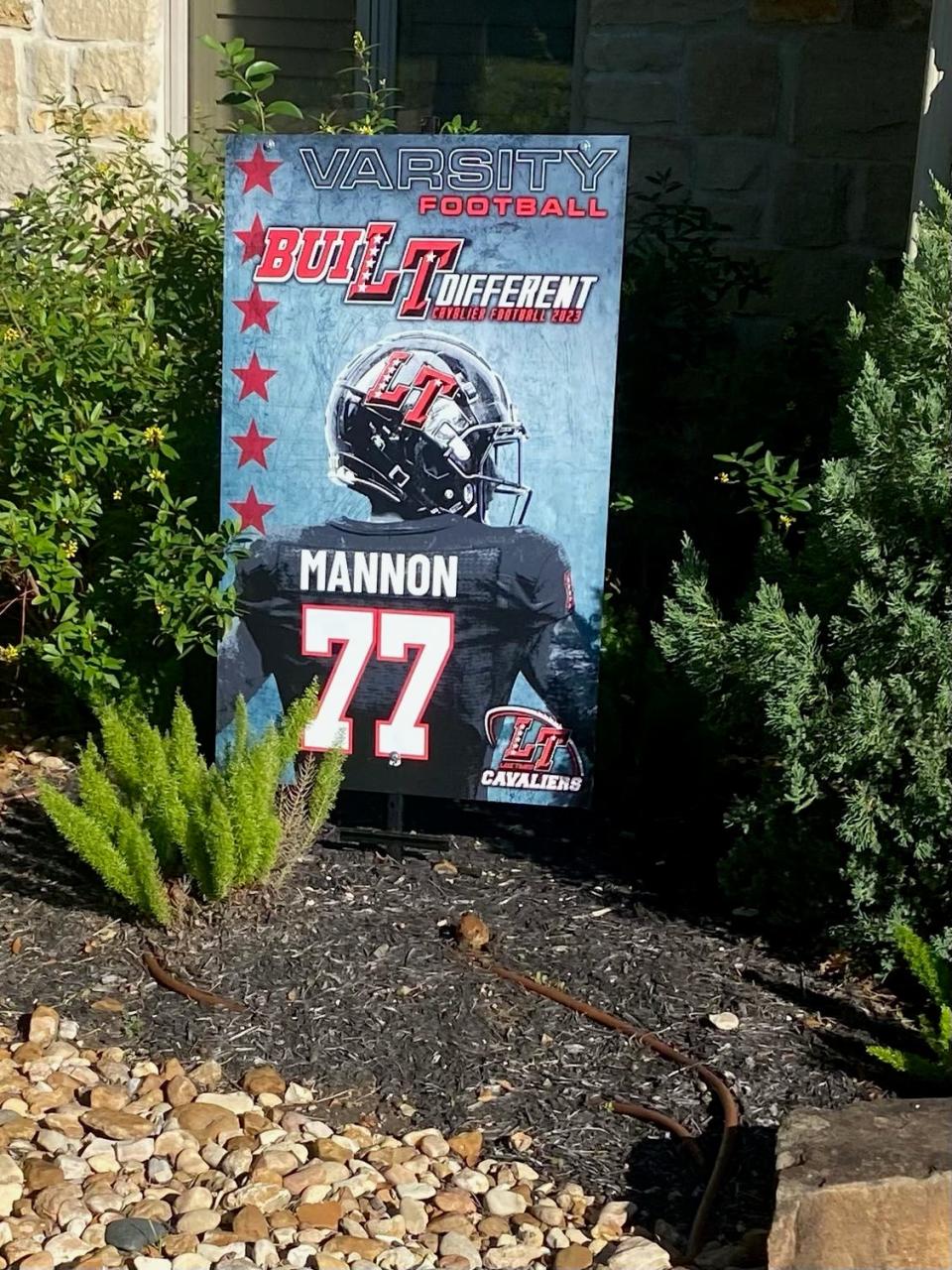 This sign for Lake Travis football player Carter Mannon is placed outside the family's home. Mannon is a starter on the offensive line.