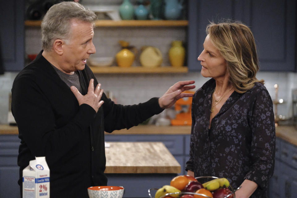 This image released by Sony Pictures Television/Spectrum Originals shows Paul Reiser, left, and Helen Hunt in a scene from "Mad About You," a reboot of the 1990s comedy series. The limited series debuts Wednesday on Spectrum Originals for on-demand subscribers. (Darren Michaels/Sony Pictures Television/Spectrum Originals via AP)