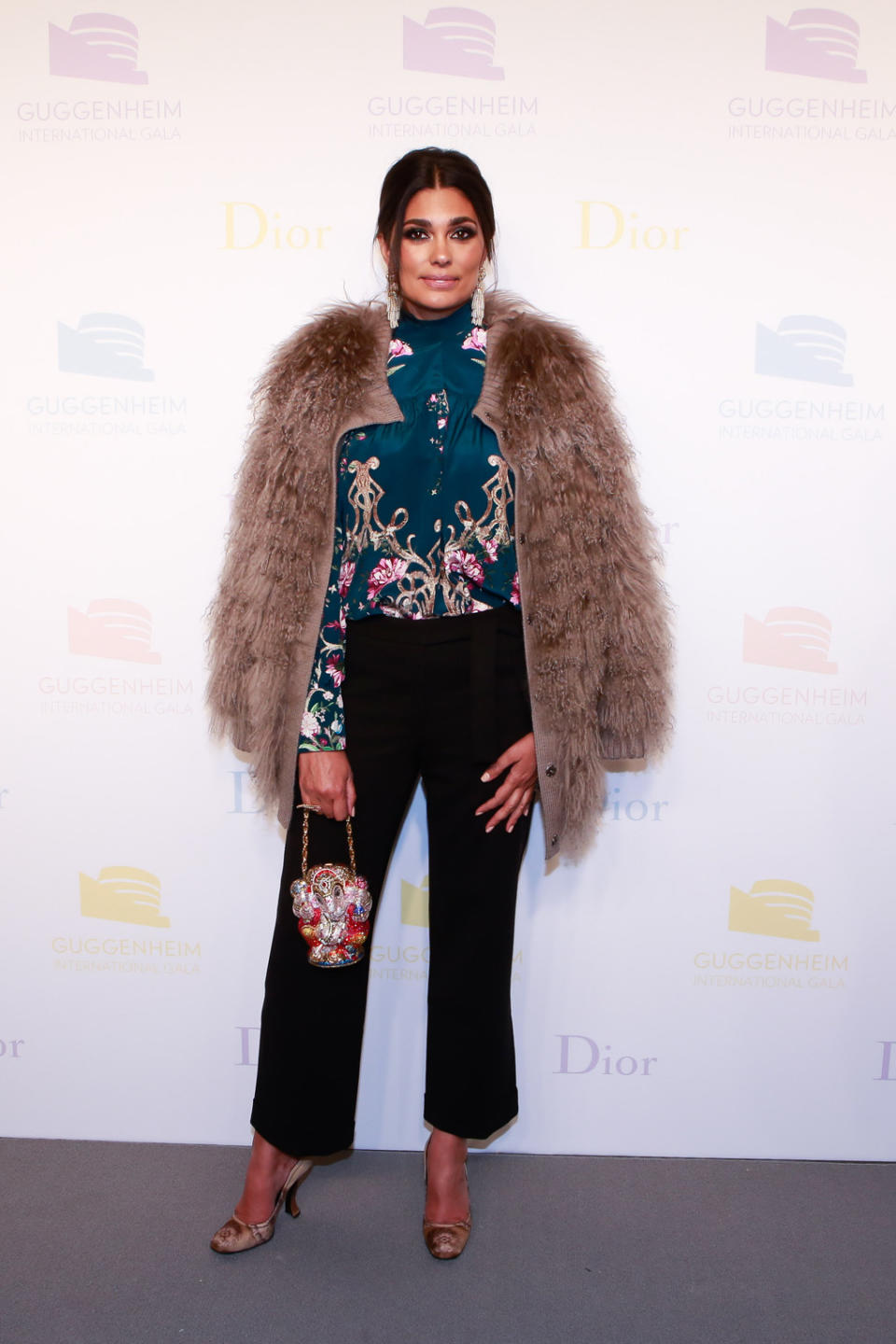 <p>Becky who? Rachel Roy was her usual fly self in a printed top, black pants and a furry jacket slung over her shoulders. She completed her look with a sparkly elephant purse. </p>