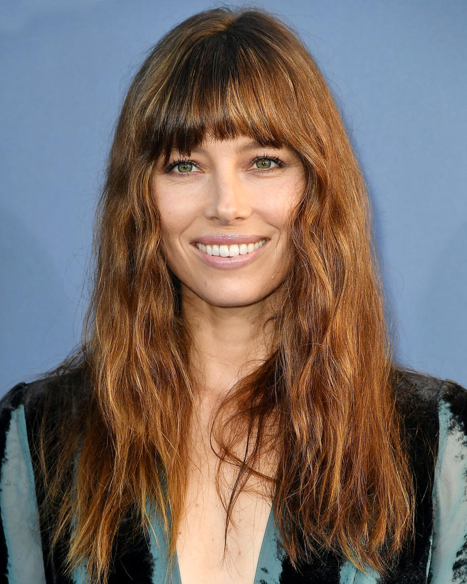 <p>Opt for middle parts and Bardot-esque fringe, says Marjan. "I would suggest using a razor for the cut to soften the edges and to style with feminine curls or natural texture to soften the facial features," our pro adds. As for the bangs, Marjan says when they are swept to the sides, the elongate the face and add softness. You can get the vibe from this pic of Jessica Biel, or look up images of Nicole Richie or Keira Knightley.</p>