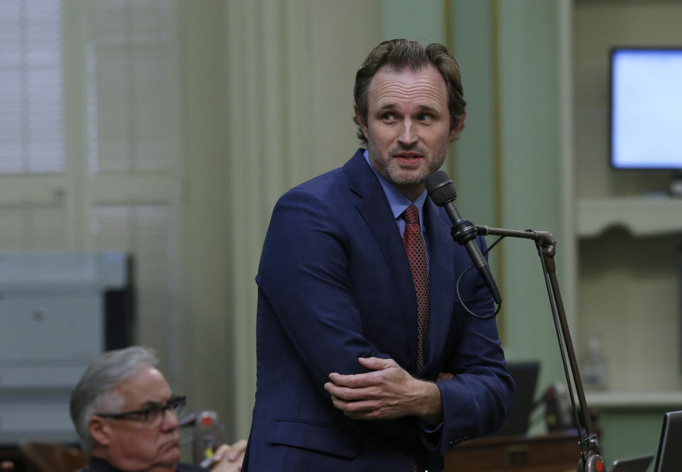 Assemblyman James Gallagher, R-Yuba City, urges lawmakers to reject a measure to give new wage and benefit protections at the so-called gig economy companies like Uber and Lyft, during the Assembly session in Sacramento, Calif., Wednesday, Sept. 11, 2019. The bill AB5, by Assemblywoman Lorenza Gonzalez, D-San Diego, was approved and now goes to the governor, who has said he supports it. (AP Photo/Rich Pedroncelli)