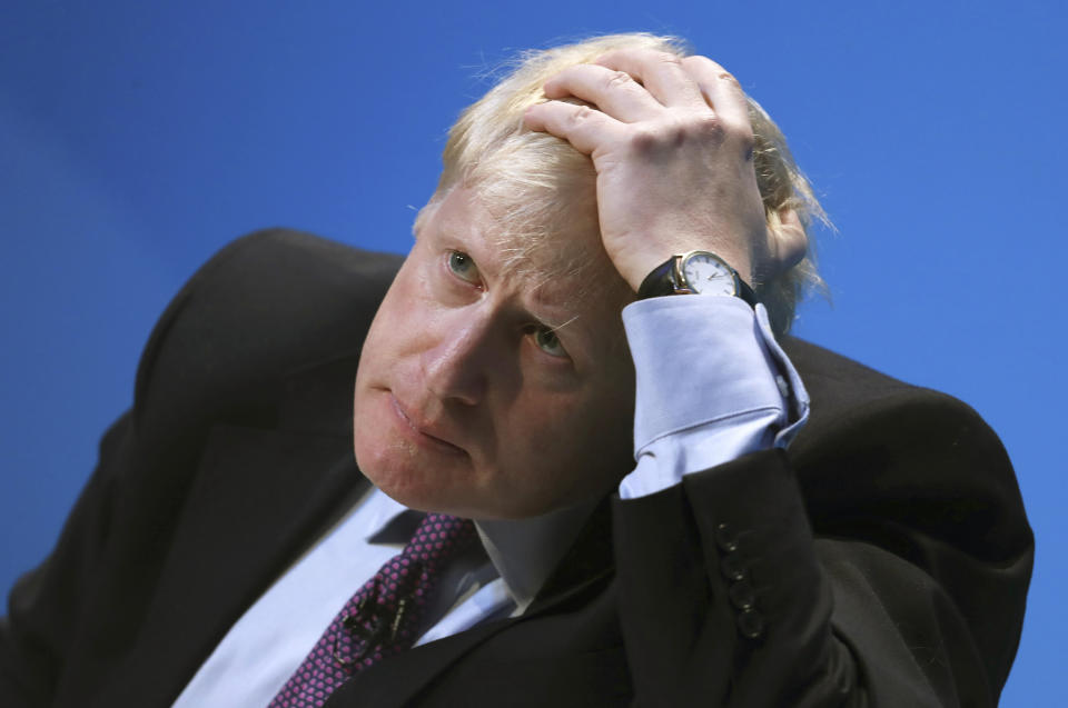 Britain's Conservative party leadership candidate Boris Johnson gestures during the first party hustings at the ICC in Birmingham, England, Saturday June 22, 2019. The two finalists in the race to lead Britain’s governing Conservative Party and become the country’s new prime minister made their first formal pitches to party members Saturday. (AP Photo/Rui Vieira)