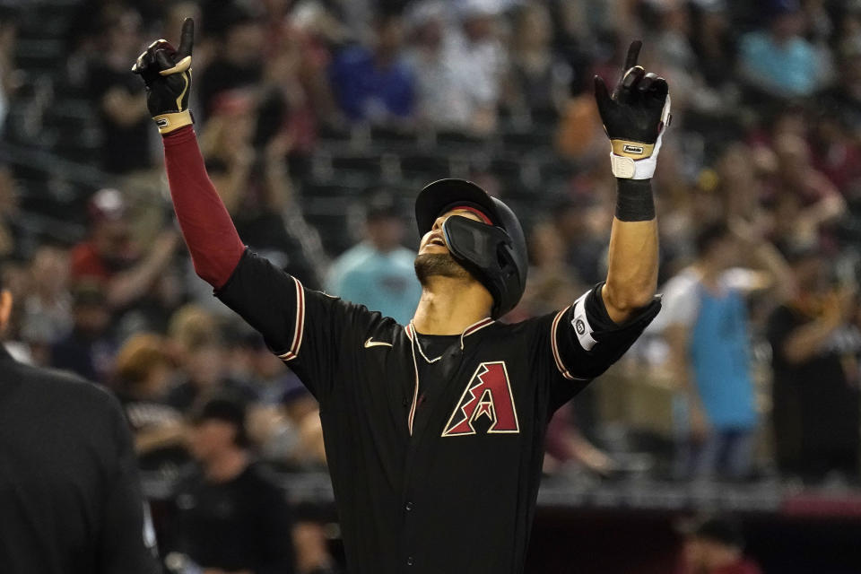 Arizona Diamondbacks' Lourdes Gurriel Jr. celebrates a solo home run against the Washington Nationals in the second inning during a baseball game, Sunday, May 7, 2023, in Phoenix. (AP Photo/Darryl Webb)