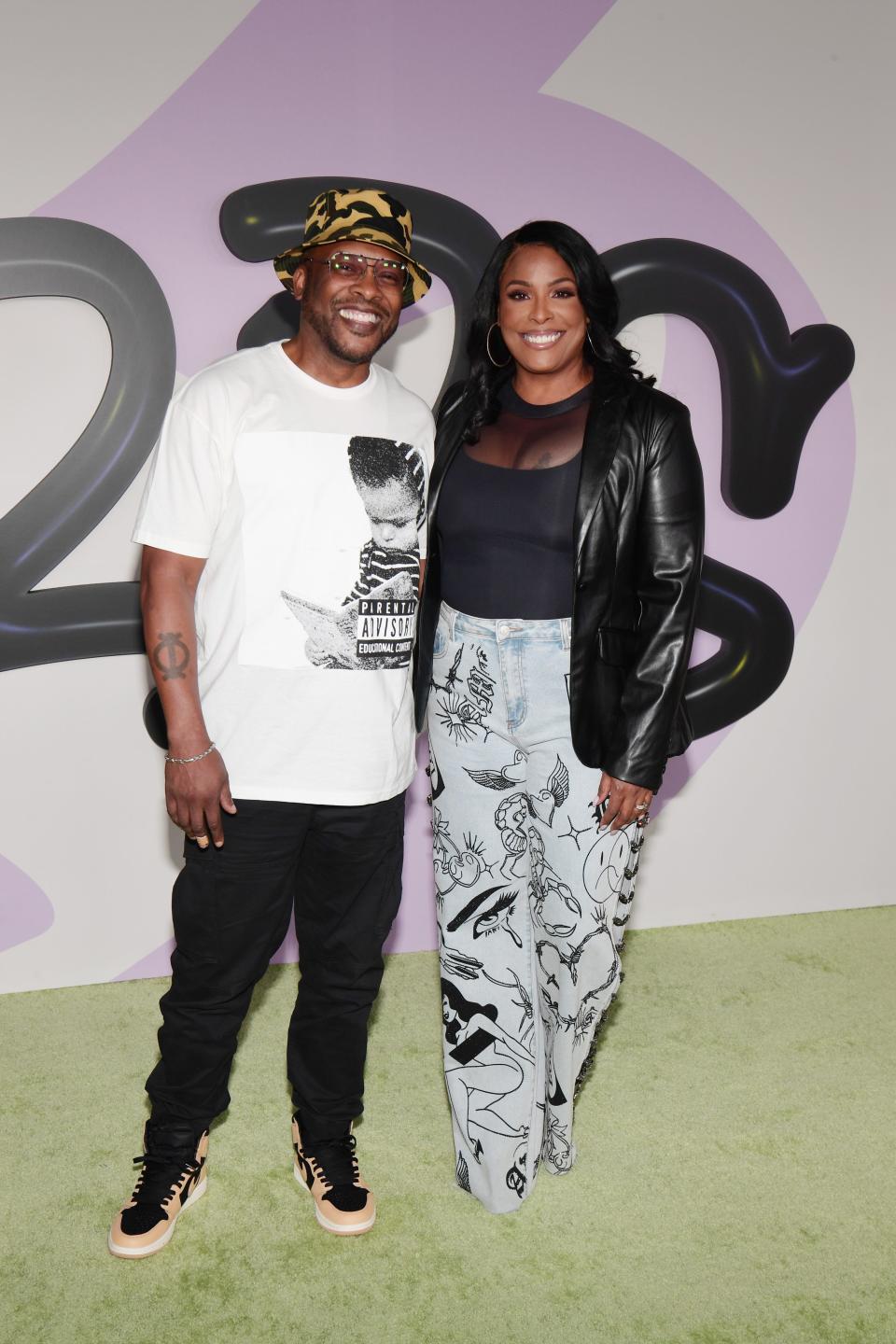 DJ Jazzy Jeff, left, and DJ Spinderella