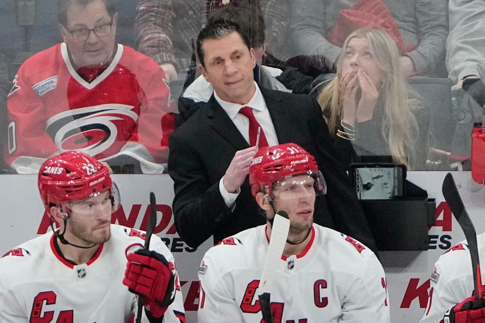 Jan 12, 2023; Columbus, Ohio, USA;  Carolina Hurricanes head coach Rod Brind'Amour talks on the bench during the second period of the NHL hockey game against the Columbus Blue Jackets at Nationwide Arena. Mandatory Credit: Adam Cairns-The Columbus Dispatch