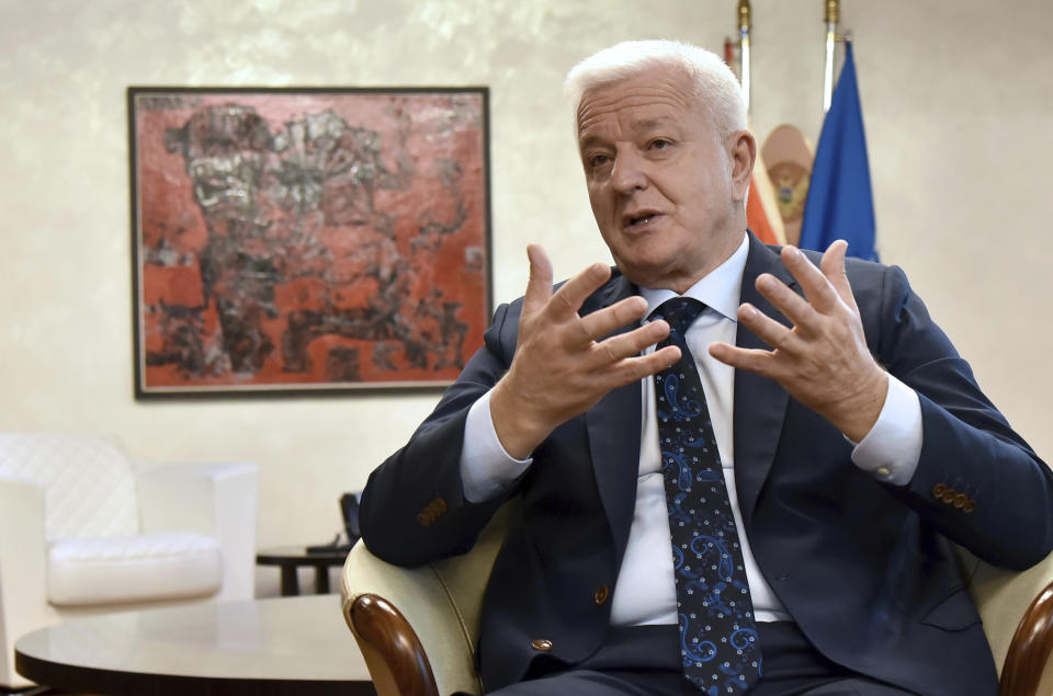 Montenegro's Prime Minister Dusko Markovic speaks during an interview with The Associated Press in Montenegro's capital Podgorica, Friday, Oct. 18, 2019. Markovic said that once Britain's Brexit split with Europe is all wrapped up, it would herald ''new opportunities for candidate countries'' to join the bloc, such as Montenegro, the Adriatic nation of some 600,000 people which is seeking EU membership. (AP Photo/Risto Bozovic)