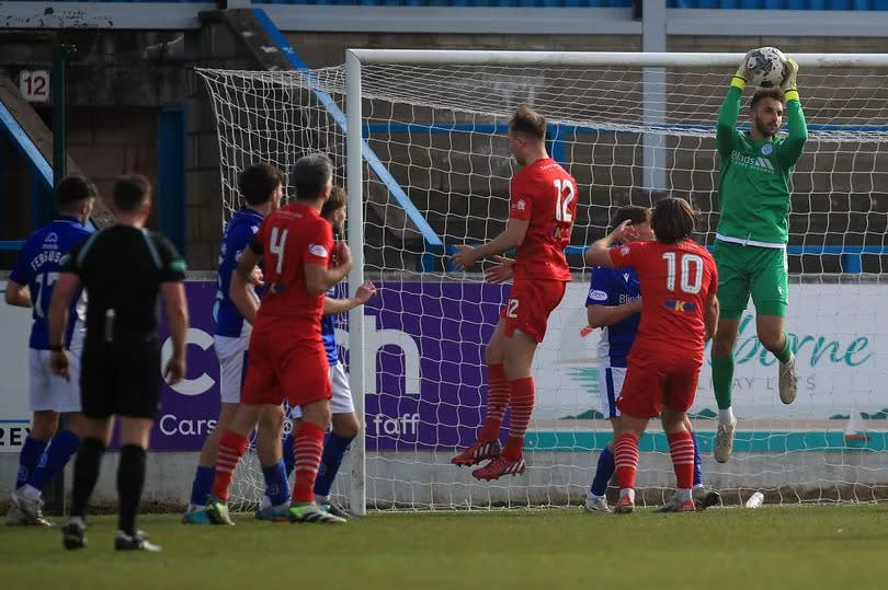 Harry Stone collects a cross