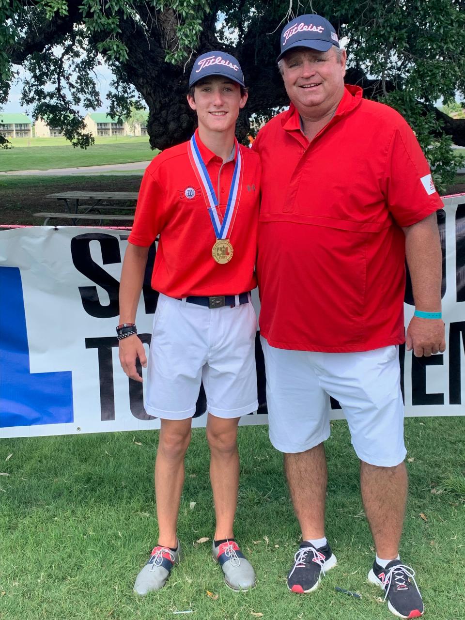 Wimberley's Jaxon Donaldson, with coach Dane Saucier, won his second UIL Class 4A individual state championship Tuesday at Legends Golf Course in Kingsland.  Donaldson earned state gold as a freshman and was runner-up last year.