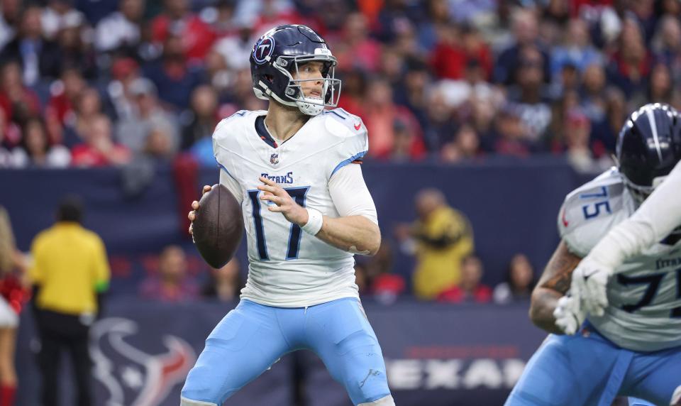 Dec 31, 2023; Houston, Texas, USA; Tennessee Titans quarterback Ryan Tannehill (17) looks for an open receiver during the fourth quarter against the Houston Texans at NRG Stadium. Mandatory Credit: Troy Taormina-USA TODAY Sports