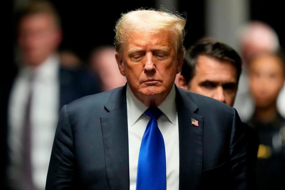 PHOTO: Former President Trump walks to make comments to members of the media after a jury convicted him of felony crimes for falsifying business records in a scheme to illegally influence the 2016 election, at Manhattan Criminal Court, May 30, 2024. (Seth Wenig/AP)