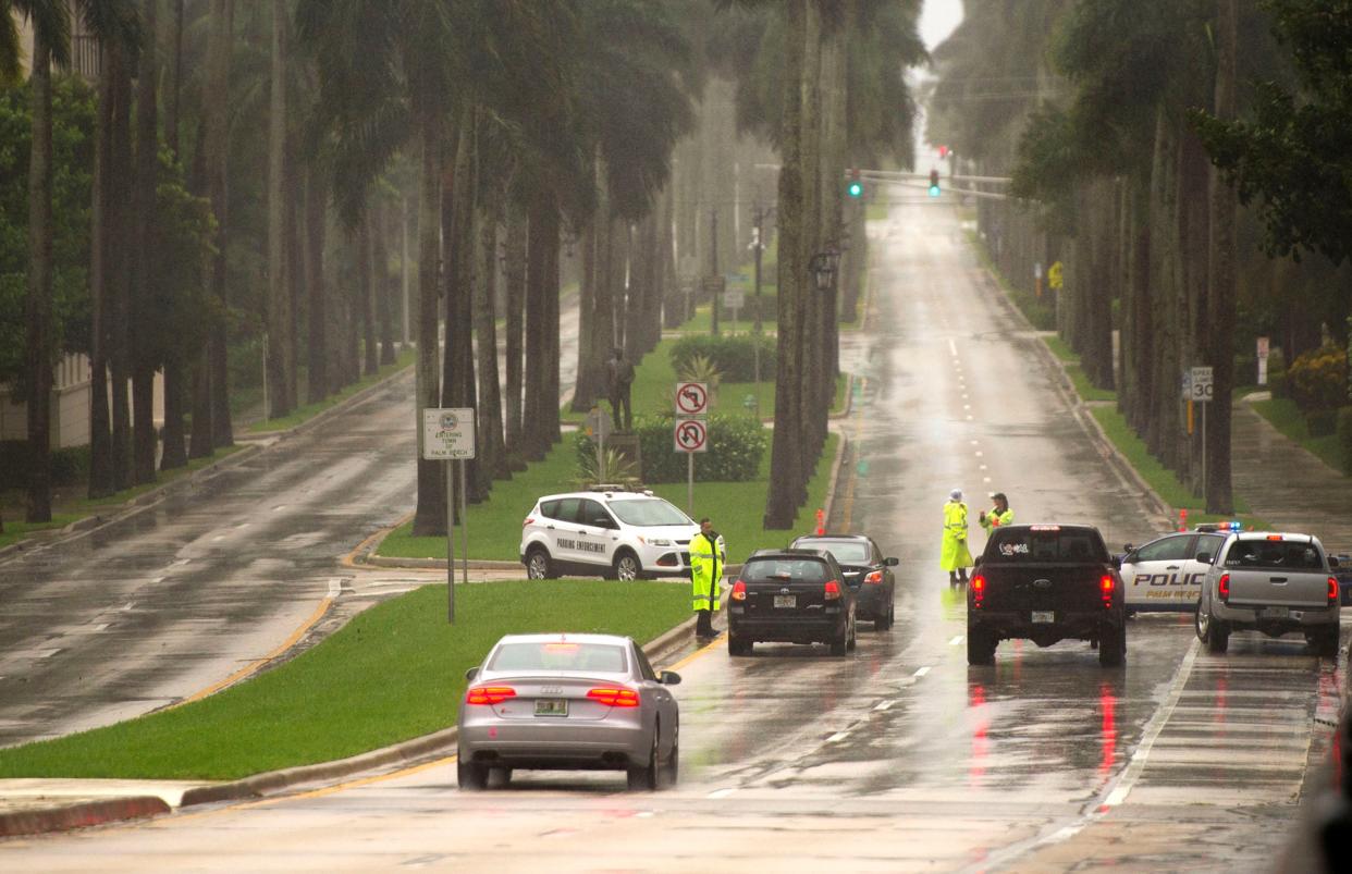 Palm Beach Police check identifications of drivers Sept. 3, 2019, on the Royal Park Bridge following Hurricane Dorian.