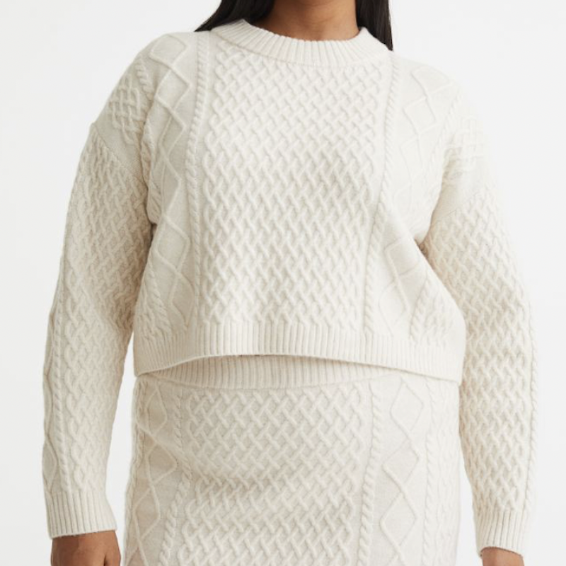 3) Cable-Knit Sweater