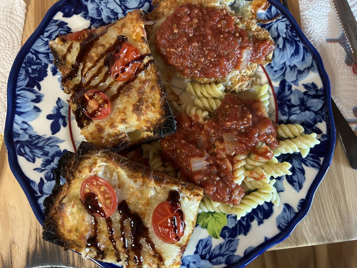 chicken parmesan with noodles and homemade garlic bread