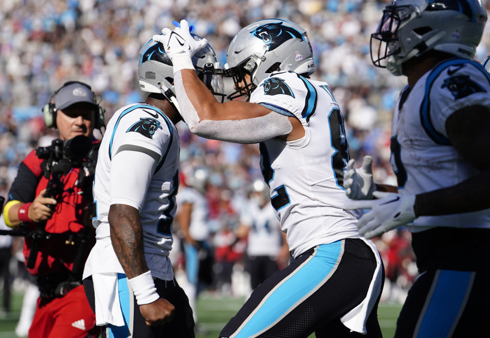 Carolina Panthers tight end Tommy Tremble, right, celebrates a touchdown with quarterback PJ Walker, left, during the second half of an NFL football game Sunday, Oct. 23, 2022, in Charlotte, N.C. (AP Photo/Jacob Kupferman)