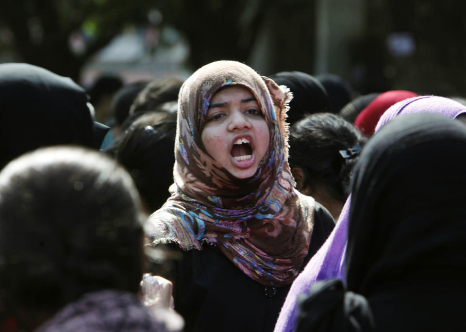 An Indian student shouts slogans during a protest rally in Hyderabad, India, Monday, Dec. 31, 2012. (AP Photo/Mahesh Kumar A.)