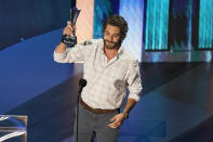 Thomas Rhett accepts the entertainer of the year award in a tie with Carrie Underwood during the 55th annual Academy of Country Music Awards at the Grand Ole Opry House on Wednesday, Sept. 16, 2020, in Nashville, Tenn. (AP Photo/Mark Humphrey)