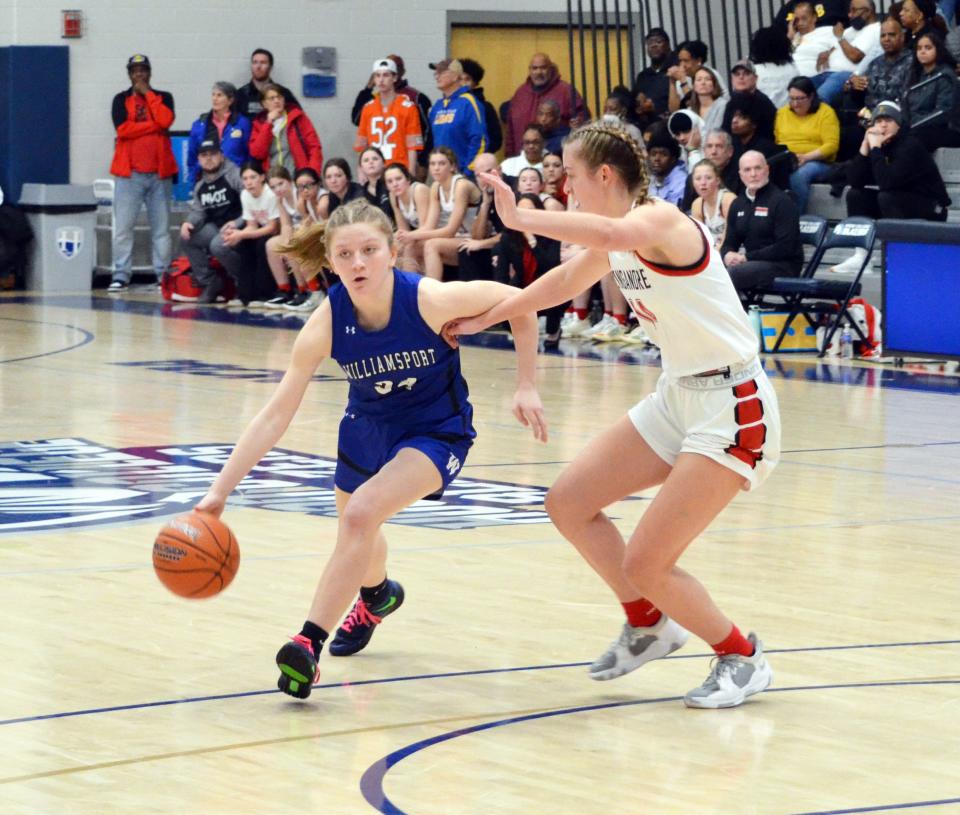 Williamsport's Mackenzie Kloos looks to drive against Linganore during the CMC championship game.