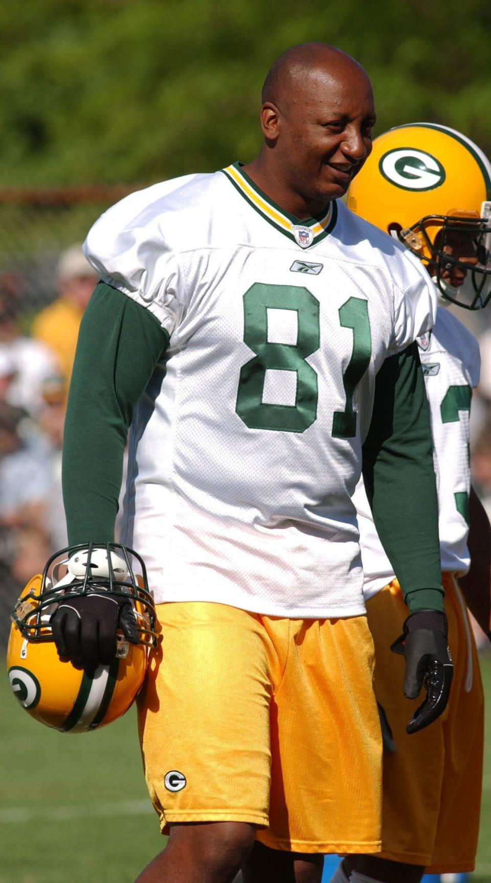 Green Bay Packers tight end Tyrone Davis takes a break during training camp on Aug. 6, 2002, at Clarke Hinkle Field in Green Bay.