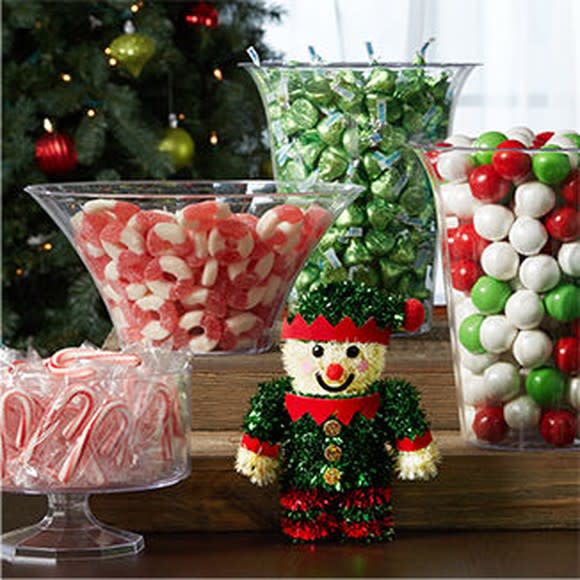 A collection of Christmas-themed candy and decorations.