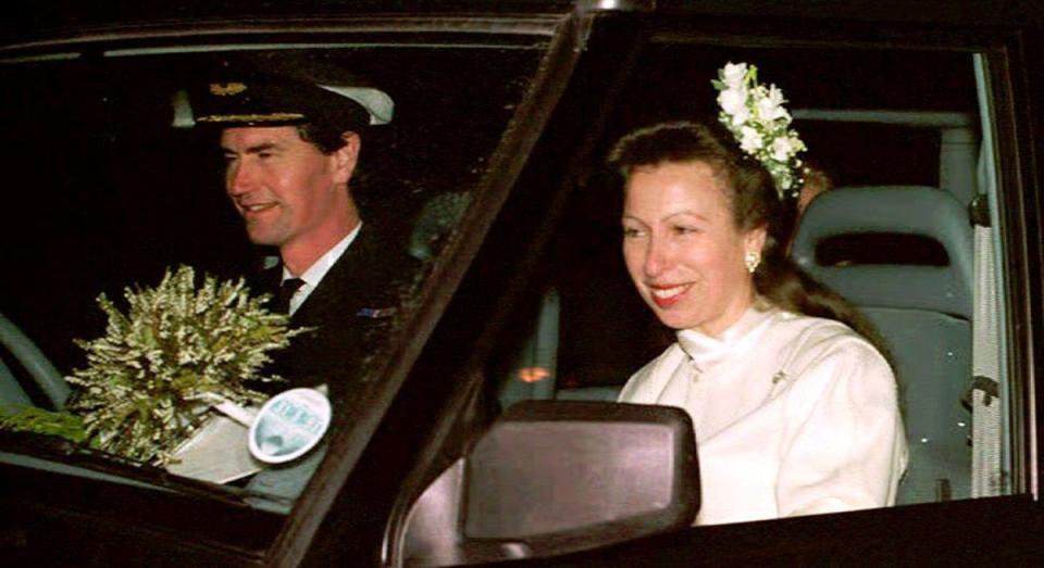 Commander Tim Laurence and  Britain’s Princess Anne are seen in their car after their wedding at Crathie Church 12 December 1992 in Scotland (AFP via Getty Images)