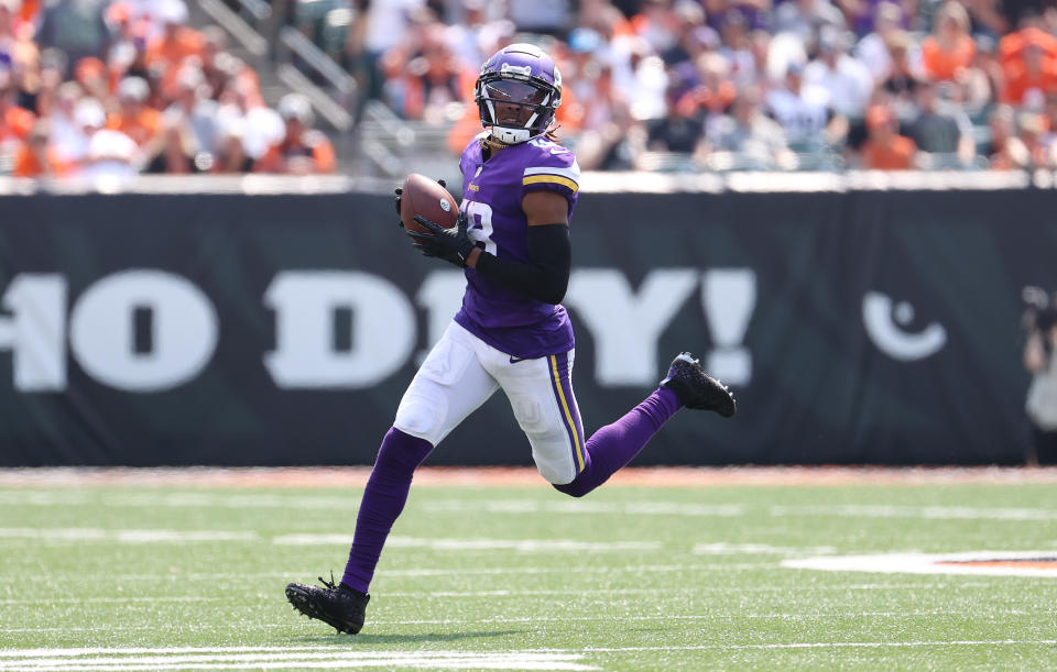 CINCINNATI, OHIO - SEPTEMBER 12: Justin Jefferson #18 of the Minnesota Vikings runs with the ball against the  Cincinnati Bengals   at Paul Brown Stadium on September 12, 2021 in Cincinnati, Ohio. (Photo by Andy Lyons/Getty Images)