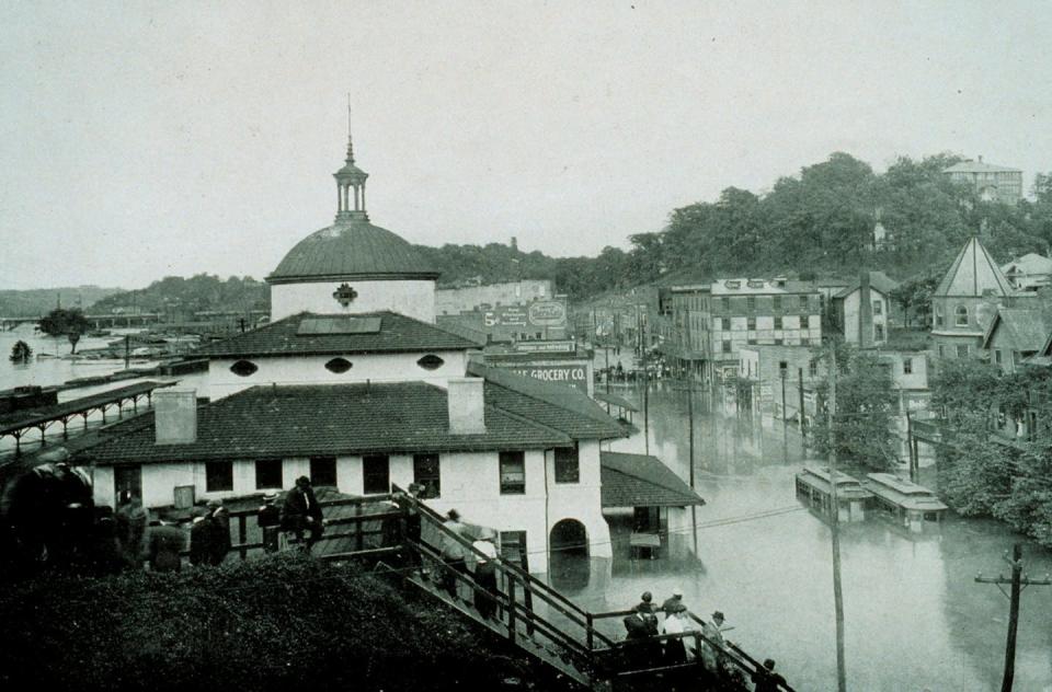 Back-to-back tropical cyclones in 1916 left businesses in Asheville, N.C., surrounded by floodwater. <a href="https://photolib.noaa.gov/Collections/National-Weather-Service/Meteorological-Monsters/Floods/emodule/645/eitem/3060" rel="nofollow noopener" target="_blank" data-ylk="slk:Archival Photography by Steve Nicklas via NOAA;elm:context_link;itc:0;sec:content-canvas" class="link ">Archival Photography by Steve Nicklas via NOAA</a>