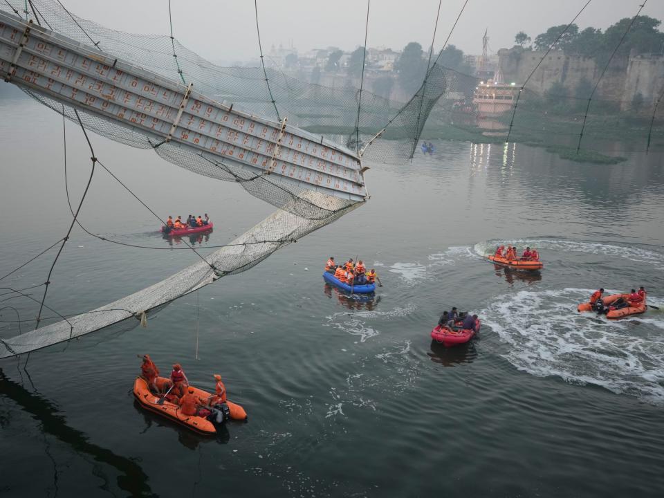 Search and rescue work is going on as a cable suspension bridge collapsed in Morbi town of western state Gujarat, India